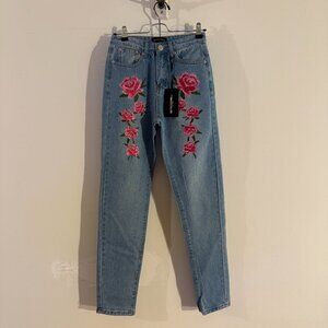 PrettyLittleThing Blue Jeans with Pink Rose Embroidery